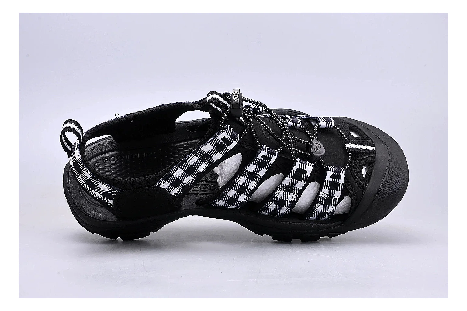 KEEN Zerraport Plaid Sandal shopping brief image showing white black plaid zerraport outdoor sandal with mixed upper and sandal shape thumbnail 5