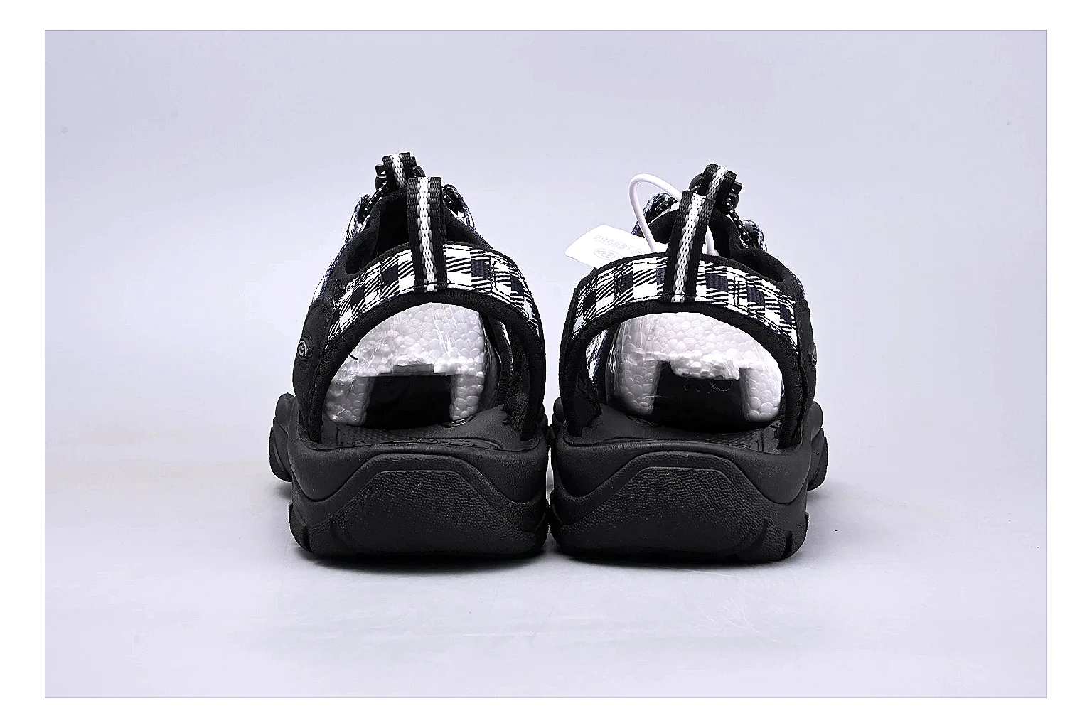 KEEN Zerraport Plaid Sandal shopping brief image showing white black plaid zerraport outdoor sandal with mixed upper and sandal shape thumbnail 6