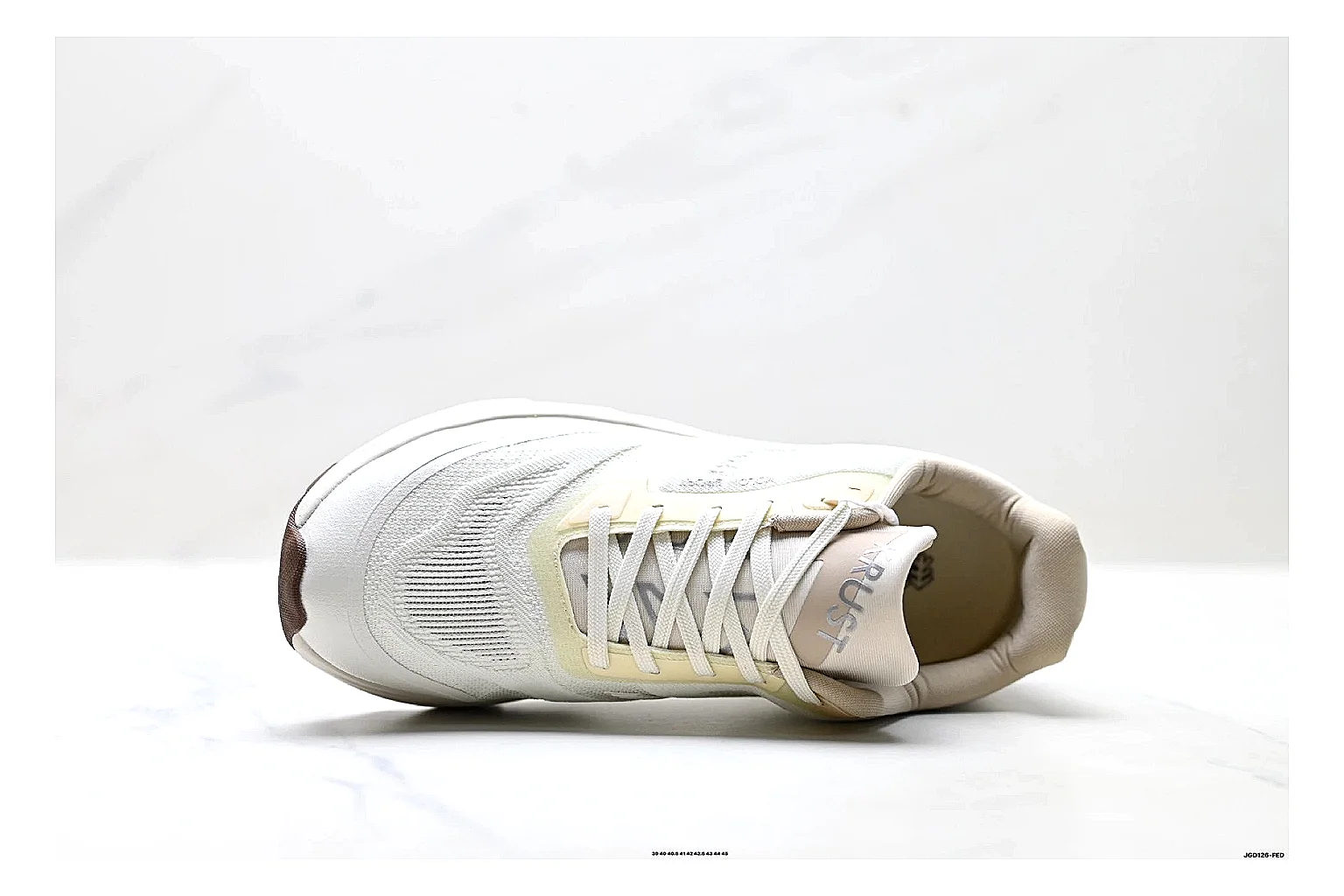 KOLON SPORT Krus V White Tan Sneakers shopping brief image showing white tan outdoor sneakers with mesh-leather texture, side-profile shape, upper panel lines, and outsole detail thumbnail 5