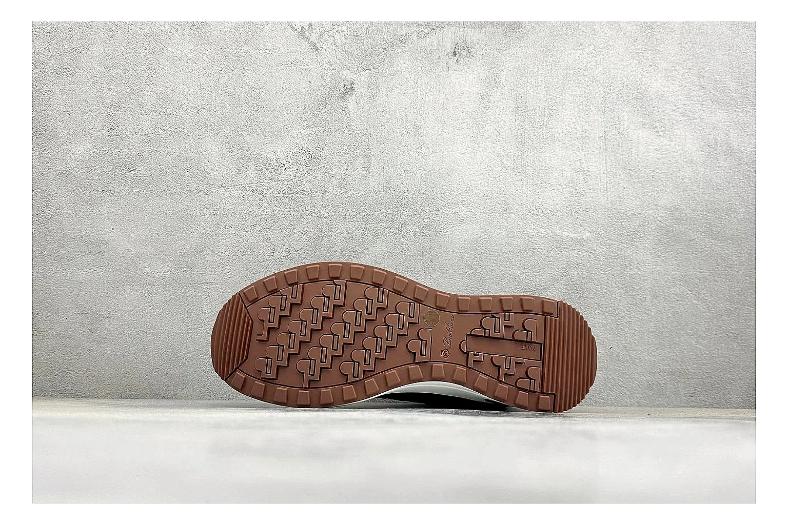 Loro Piana Week-End Black shopping brief image showing black suede upper, low casual profile, striped midsole accent, and soft everyday shape thumbnail 2