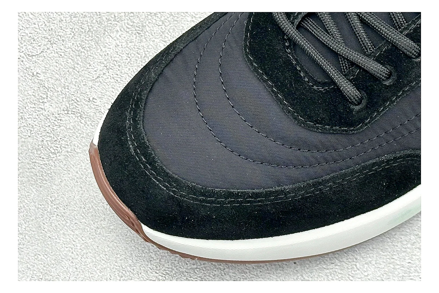 Loro Piana Week-End Black shopping brief image showing black suede upper, low casual profile, striped midsole accent, and soft everyday shape thumbnail 3