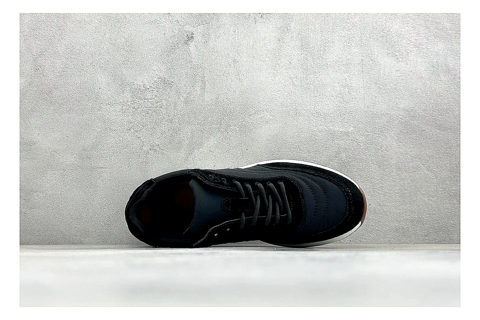 Loro Piana Week-End Black shopping brief image showing black suede upper, low casual profile, striped midsole accent, and soft everyday shape thumbnail 5