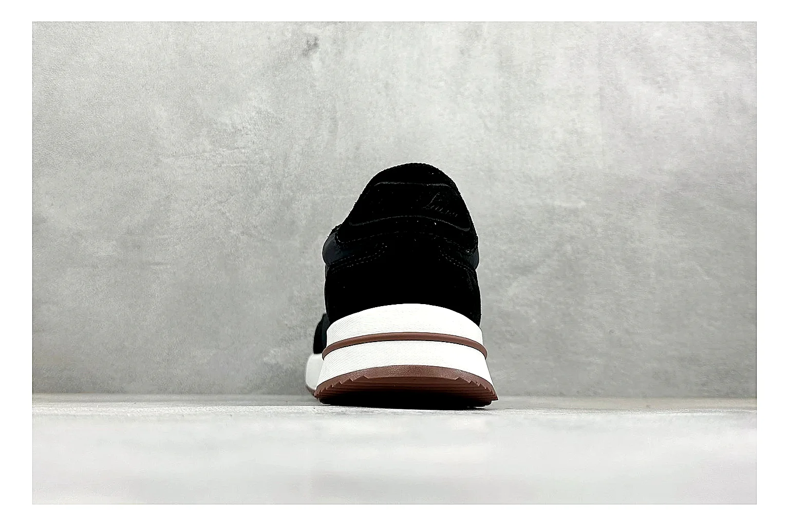 Loro Piana Week-End Black shopping brief image showing black suede upper, low casual profile, striped midsole accent, and soft everyday shape thumbnail 6