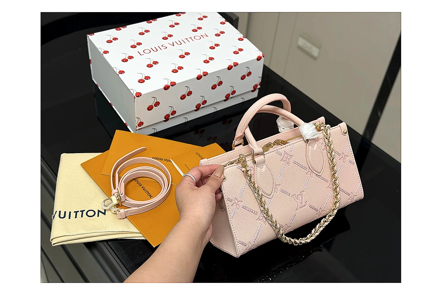 Louis Vuitton Mini Top Handle Pink shopping brief photo showing pink leather mini bag body, structured top handle, compact luxury shape, and clean hardware details thumbnail 4