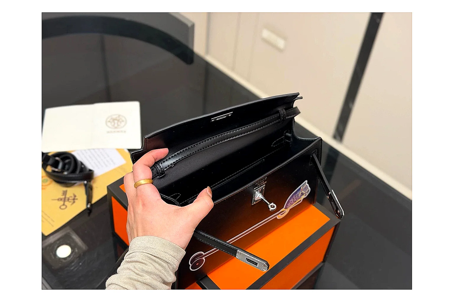 Louis Vuitton Wallet On Chain Black shopping brief photo showing black leather wallet-bag body, compact flap shape, chain strap, and polished LV-style hardware thumbnail 2