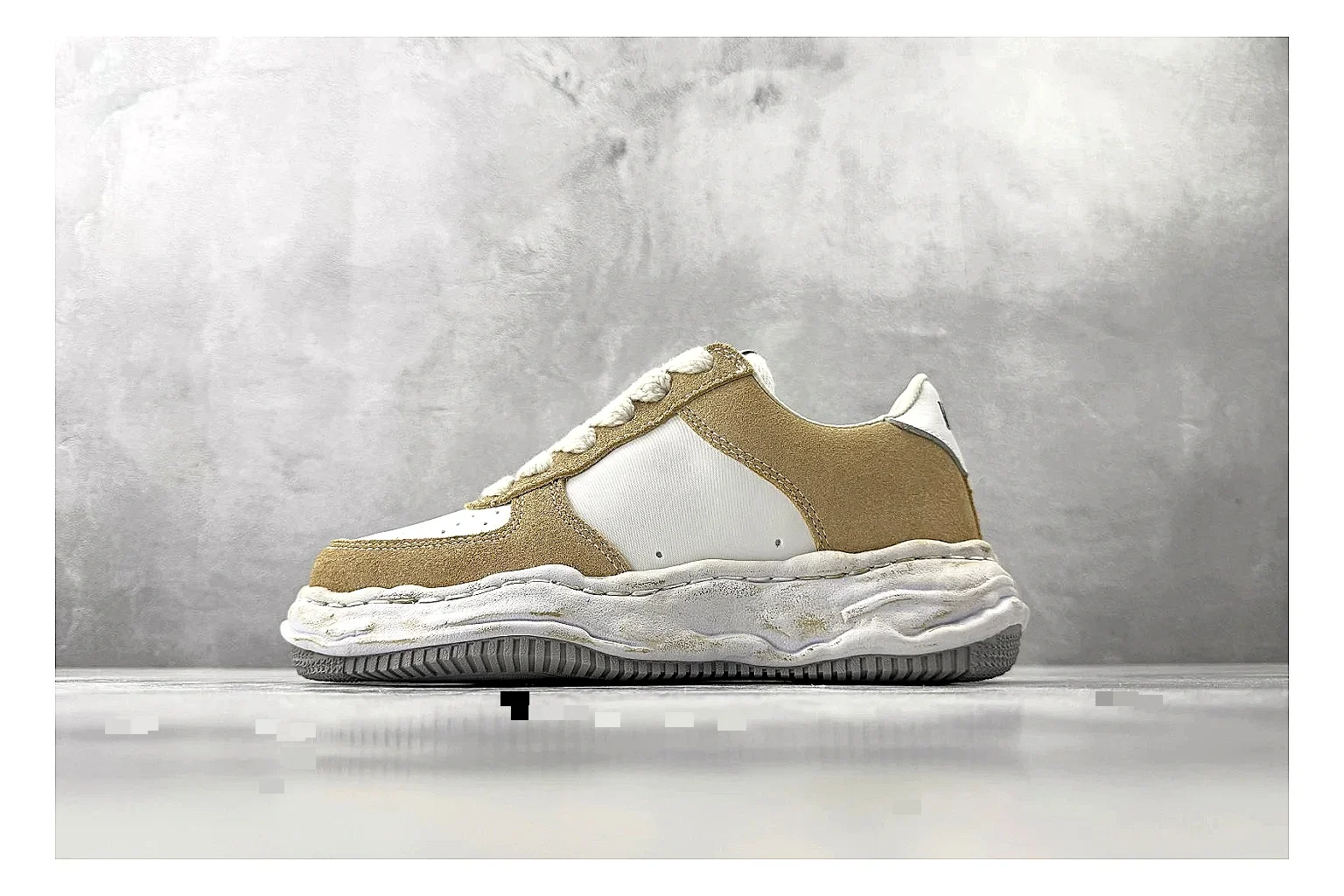 Maison Mihara Yasuhiro Blakey Beige Distressed shopping brief photo showing beige distressed canvas upper, warped sculpted white sole, low lace profile, and intentionally worn texture