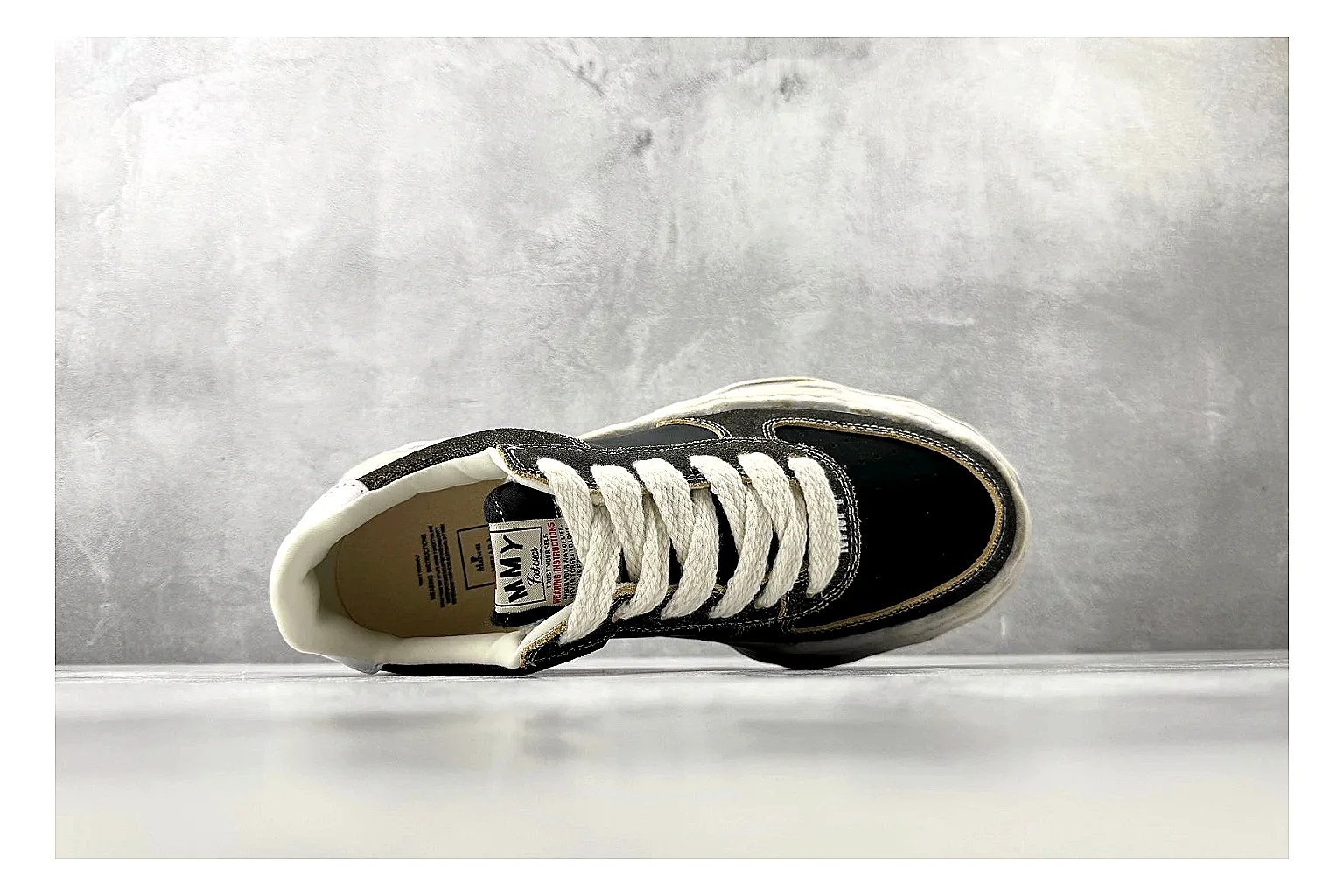 Maison Mihara Yasuhiro Blakey Black Distressed shopping brief photo showing black distressed canvas upper, warped sculpted white sole, low lace profile, and worn texture thumbnail 5