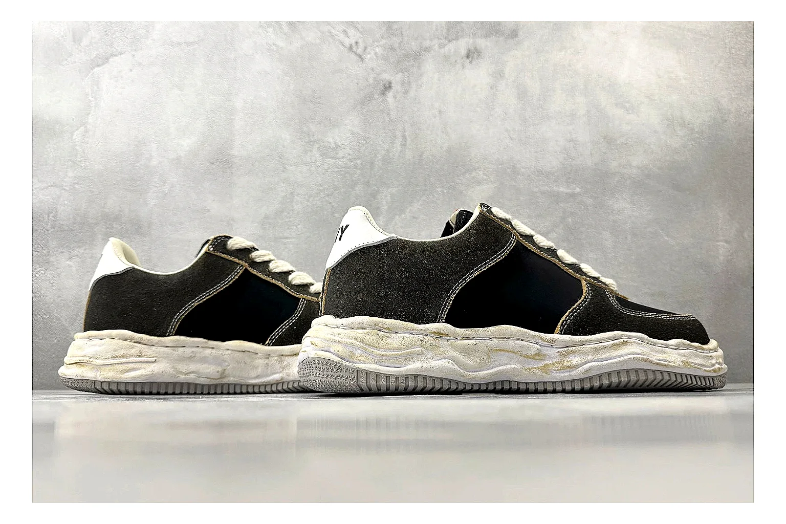 Maison Mihara Yasuhiro Blakey Black Distressed shopping brief photo showing black distressed canvas upper, warped sculpted white sole, low lace profile, and worn texture thumbnail 6