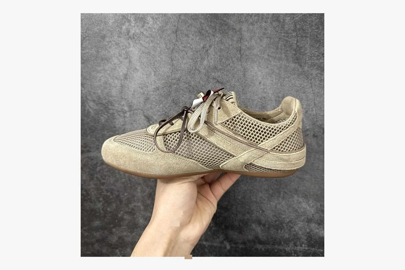 Miu Miu Beige Logo Sneaker shopping brief image showing beige logo low-top with mixed-material upper and low-profile shape