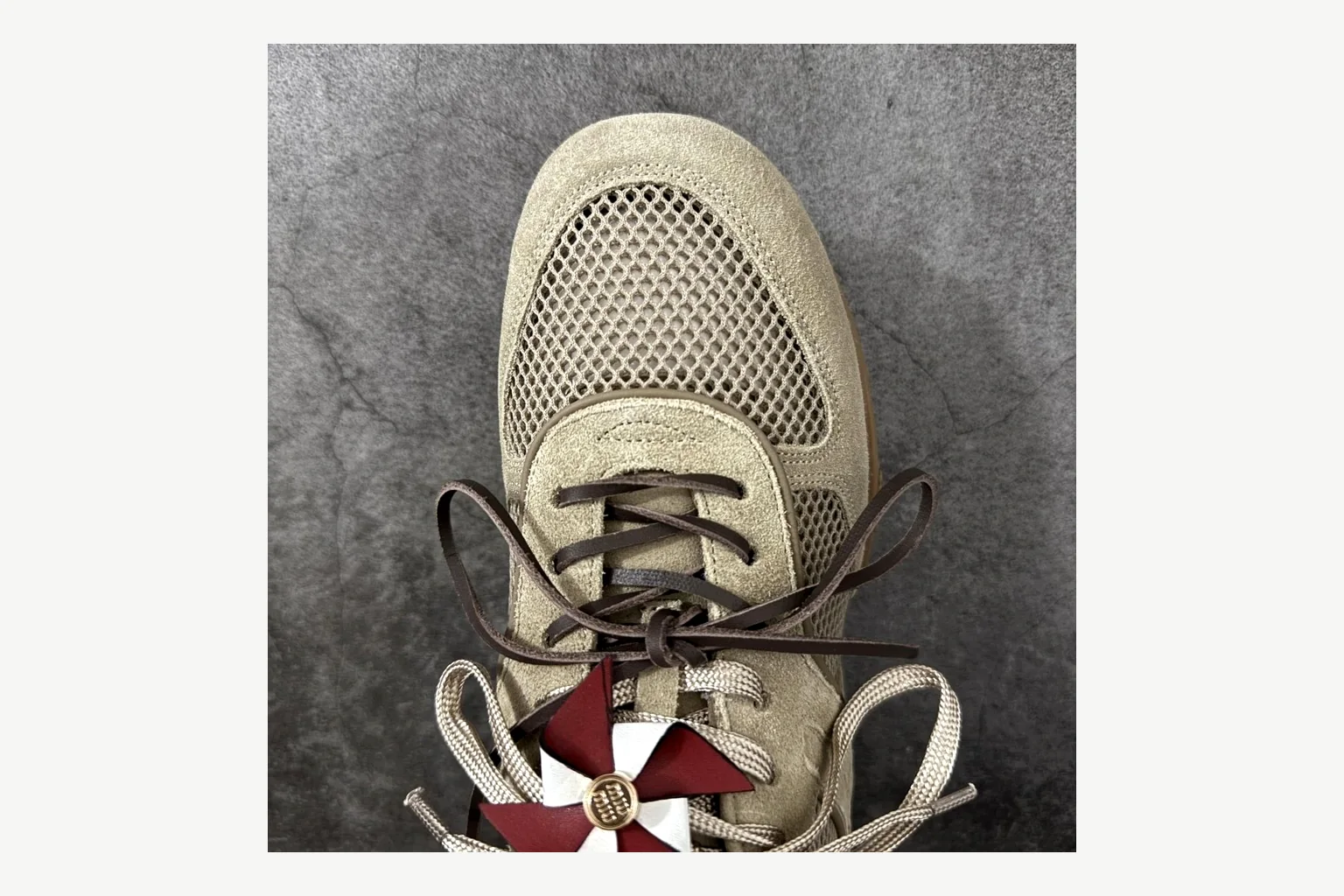 Miu Miu Beige Logo Sneaker shopping brief image showing beige logo low-top with mixed-material upper and low-profile shape thumbnail 2