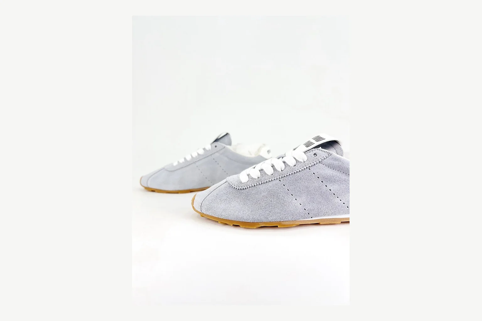 Miu Miu Grey Low Sneaker shopping brief image showing grey fashion low-top with mixed-material upper and low-profile shape thumbnail 2