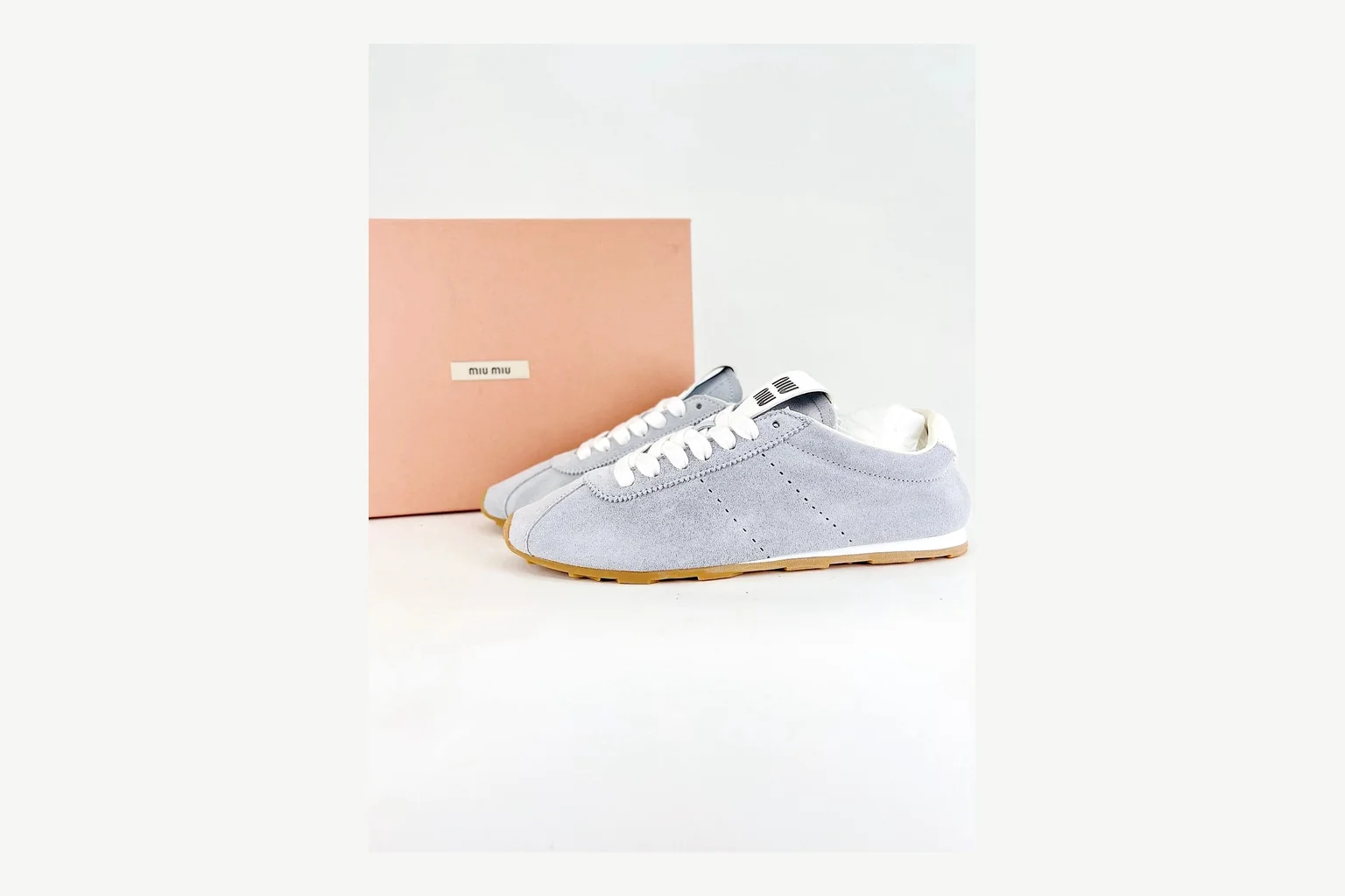 Miu Miu Grey Low Sneaker shopping brief image showing grey fashion low-top with mixed-material upper and low-profile shape thumbnail 4