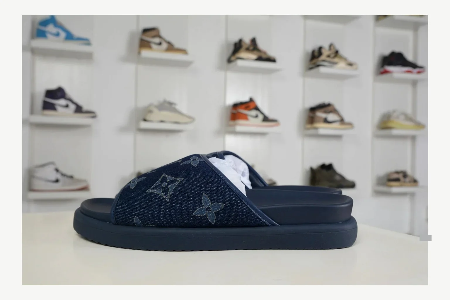 Miu Miu Navy Denim Slide shopping brief image showing navy denim denim slide with denim upper and low-profile shape