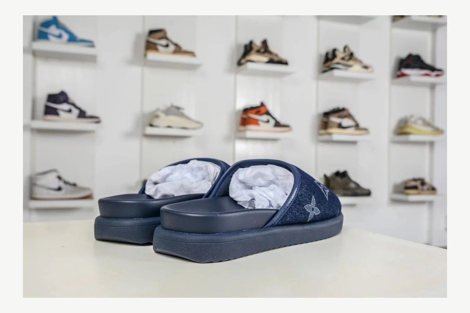 Miu Miu Navy Denim Slide shopping brief image showing navy denim denim slide with denim upper and low-profile shape thumbnail 3