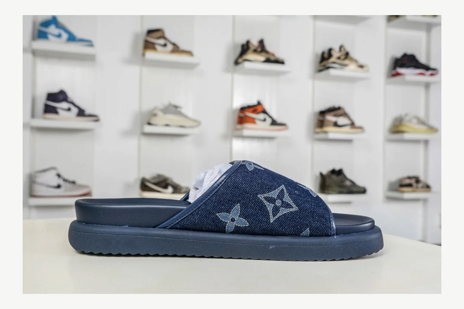 Miu Miu Navy Denim Slide shopping brief image showing navy denim denim slide with denim upper and low-profile shape thumbnail 5