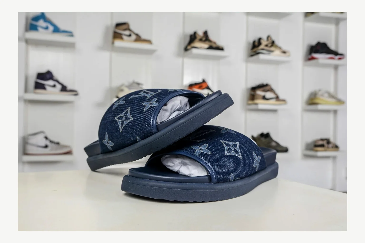 Miu Miu Navy Denim Slide shopping brief image showing navy denim denim slide with denim upper and low-profile shape thumbnail 6