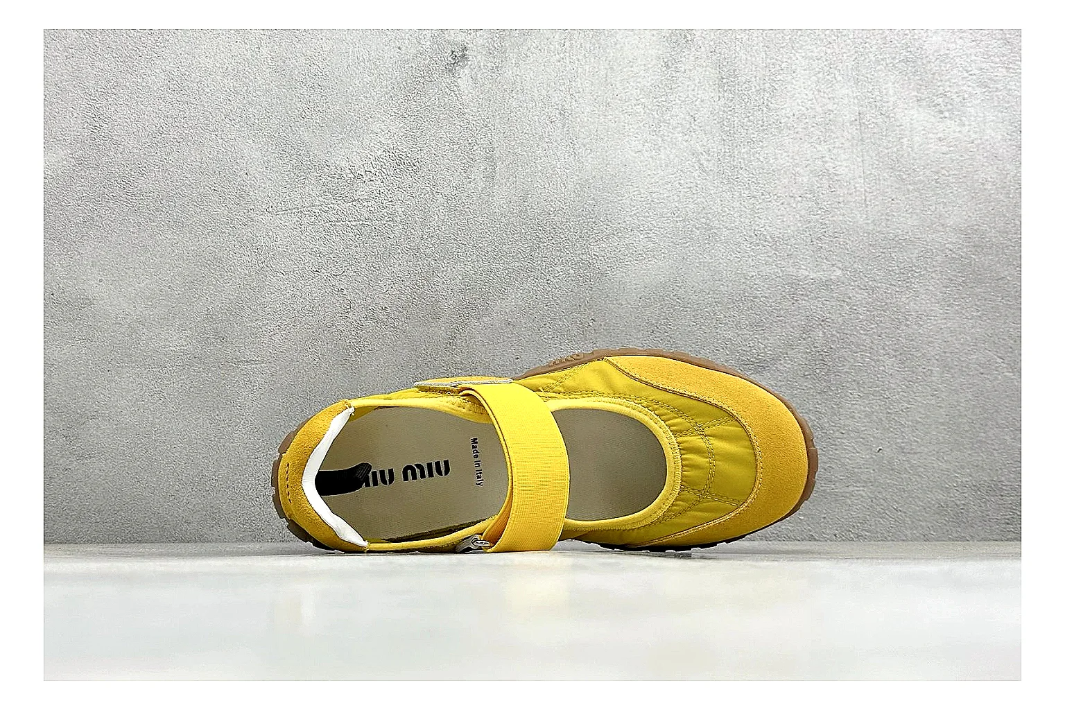 Miu Miu Tyre Yellow Mary Jane shopping brief photo showing yellow Mary Jane upper, strap closure, rugged Tyre outsole, and playful low-profile shape thumbnail 5