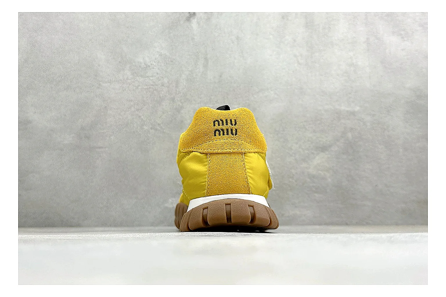 Miu Miu Tyre Yellow Mary Jane shopping brief photo showing yellow Mary Jane upper, strap closure, rugged Tyre outsole, and playful low-profile shape thumbnail 6