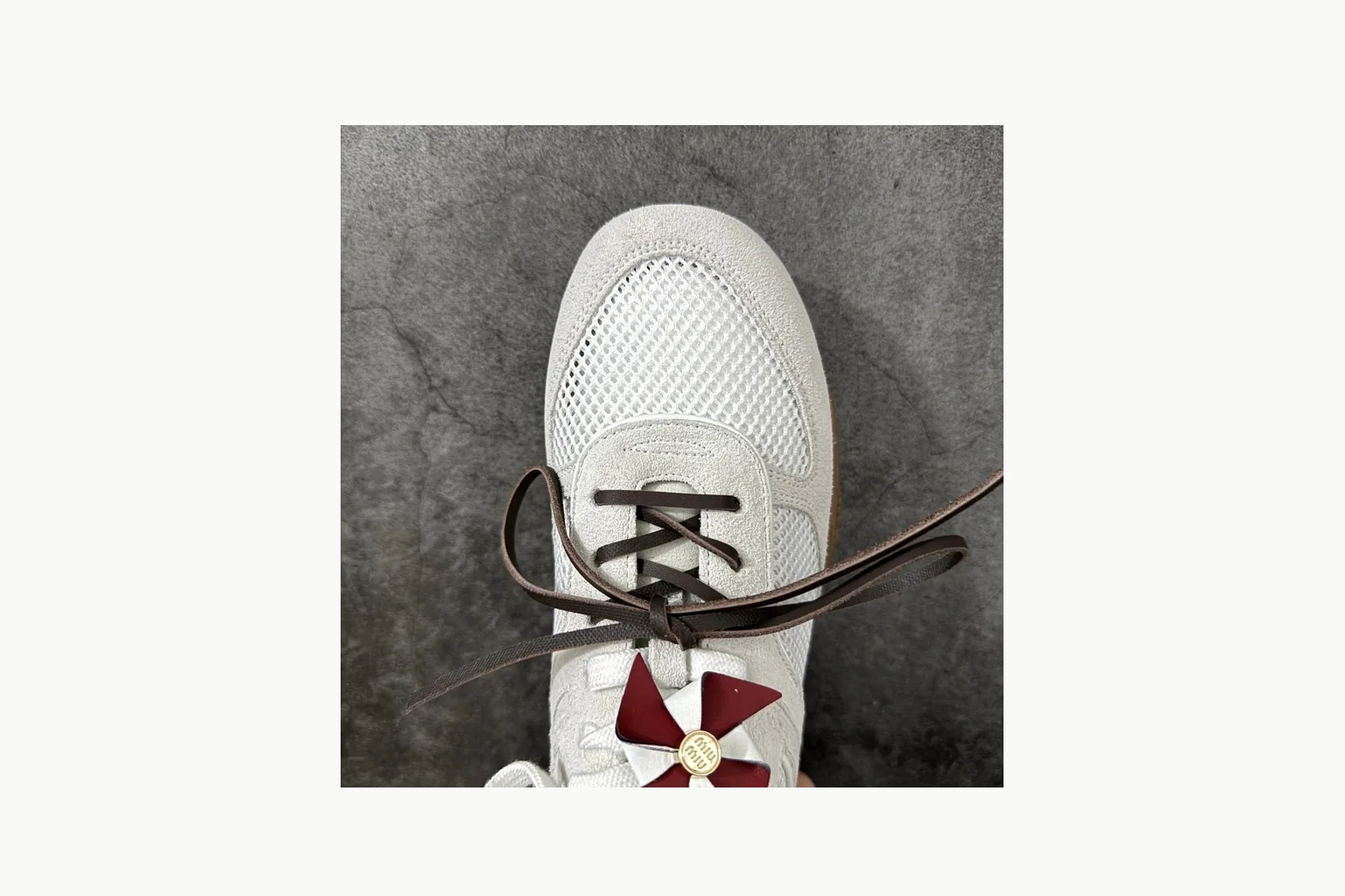Miu Miu White Bow Sneaker shopping brief image showing white bow-detail low-top with mixed-material upper and low-profile shape thumbnail 2