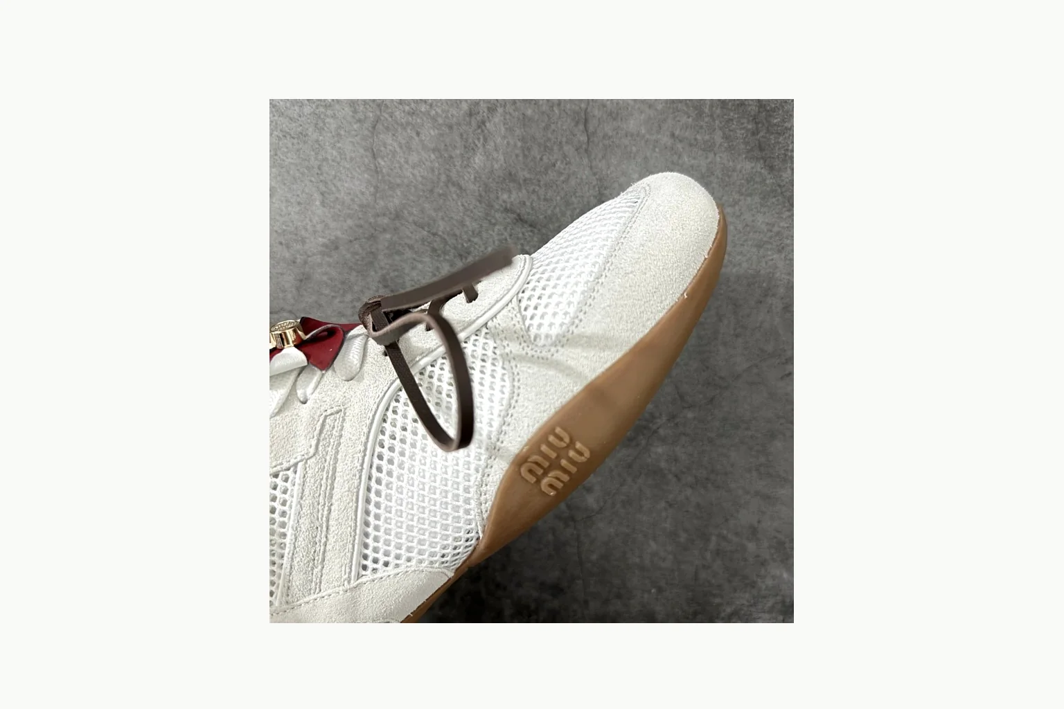 Miu Miu White Bow Sneaker shopping brief image showing white bow-detail low-top with mixed-material upper and low-profile shape thumbnail 3