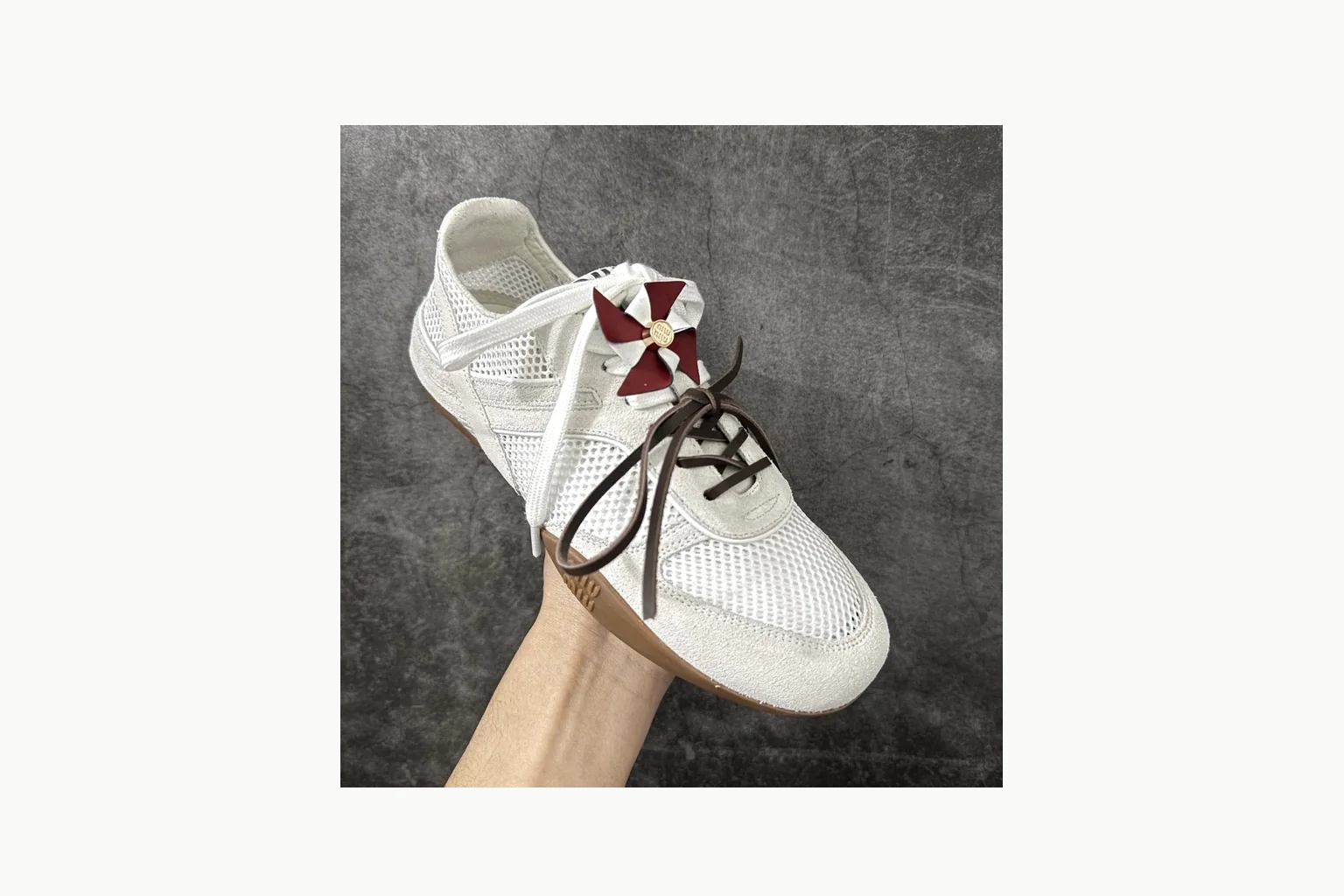 Miu Miu White Bow Sneaker shopping brief image showing white bow-detail low-top with mixed-material upper and low-profile shape thumbnail 5