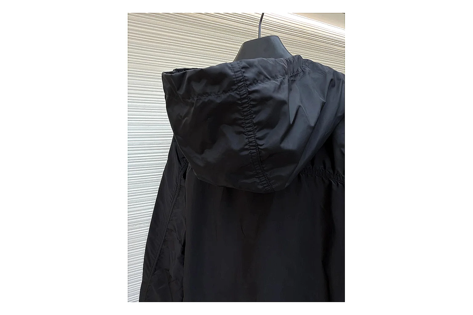 Moncler Nylon Hooded Jacket Black Jacket shopping brief image showing black nylon hooded jacket with nylon texture, hood structure, zipper line, sleeve cuffs, and light shell shape thumbnail 2