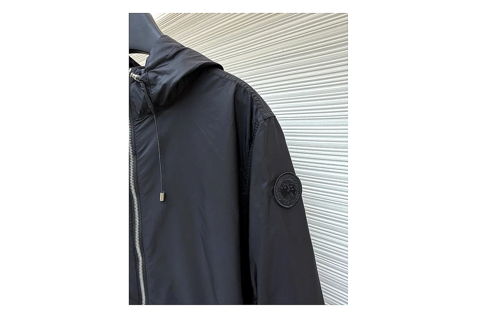 Moncler Nylon Hooded Jacket Black Jacket shopping brief image showing black nylon hooded jacket with nylon texture, hood structure, zipper line, sleeve cuffs, and light shell shape thumbnail 3