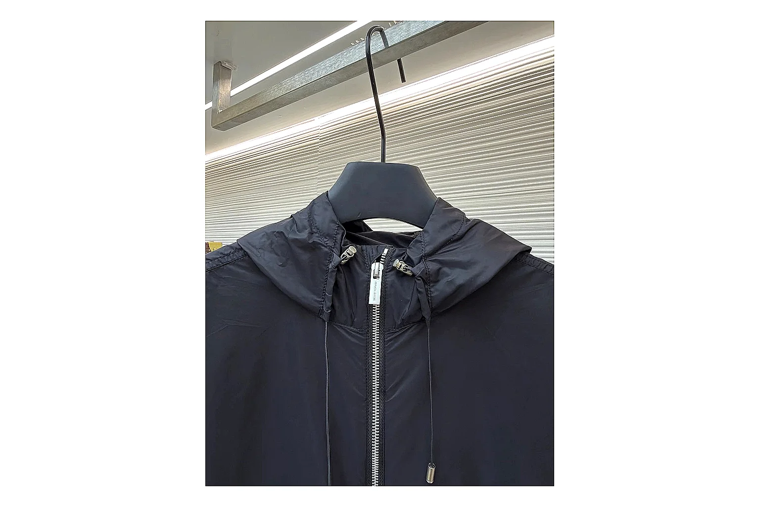 Moncler Nylon Hooded Jacket Black Jacket shopping brief image showing black nylon hooded jacket with nylon texture, hood structure, zipper line, sleeve cuffs, and light shell shape thumbnail 4