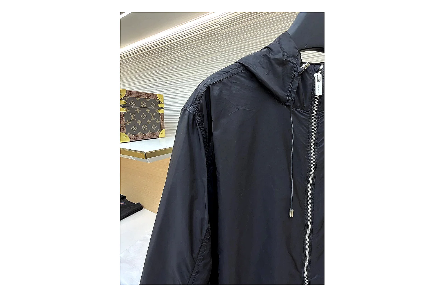 Moncler Nylon Hooded Jacket Black Jacket shopping brief image showing black nylon hooded jacket with nylon texture, hood structure, zipper line, sleeve cuffs, and light shell shape thumbnail 6