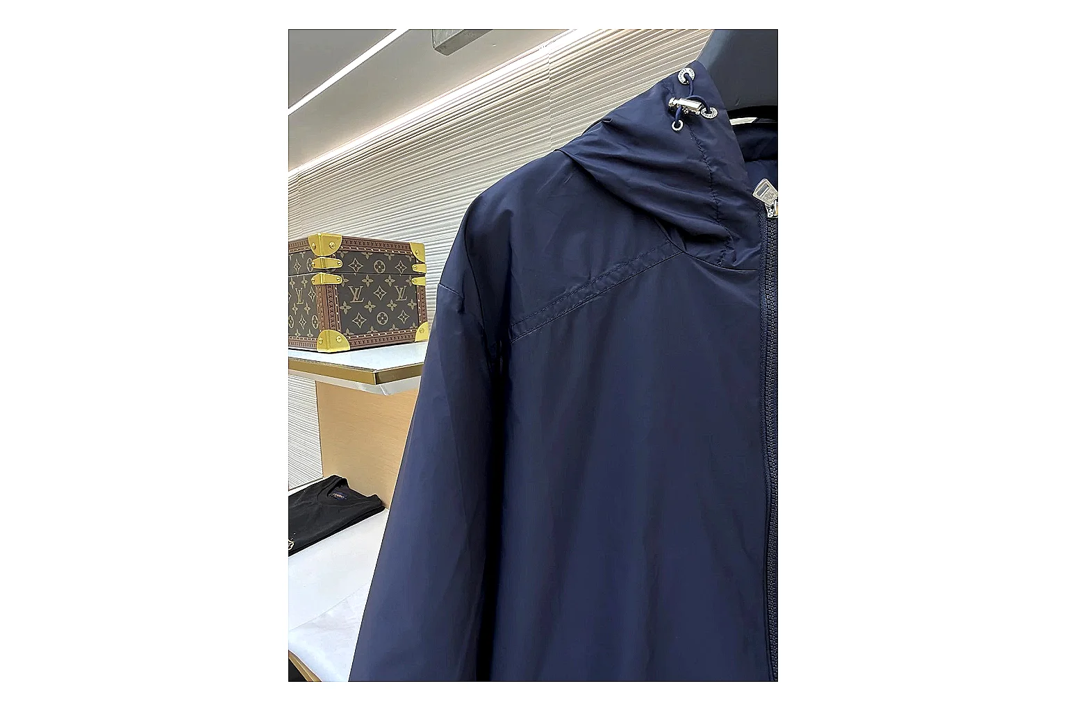 Moncler Nylon Hooded Jacket Navy Jacket shopping brief image showing navy nylon hooded jacket with nylon texture, hood structure, zipper line, sleeve cuffs, and light shell shape thumbnail 6