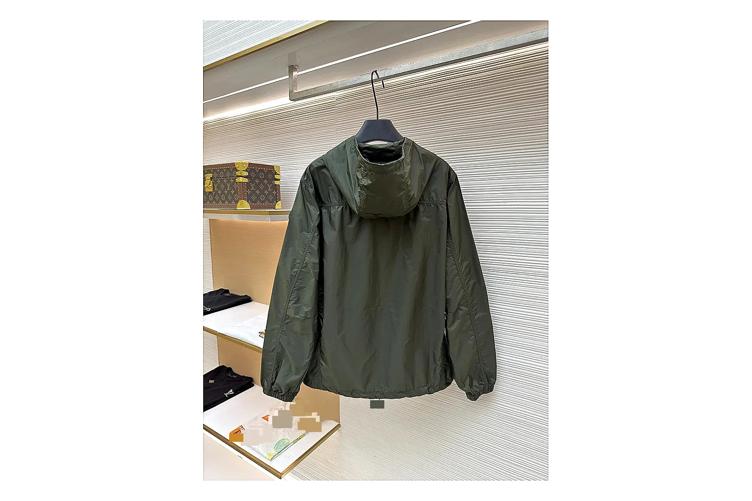 Moncler Nylon Hooded Jacket Olive Jacket shopping brief image showing olive nylon hooded jacket with nylon texture, hood structure, zipper line, sleeve cuffs, and light shell shape