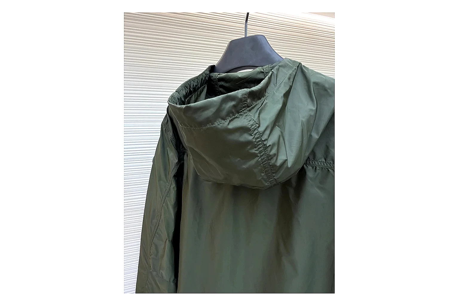 Moncler Nylon Hooded Jacket Olive Jacket shopping brief image showing olive nylon hooded jacket with nylon texture, hood structure, zipper line, sleeve cuffs, and light shell shape thumbnail 2