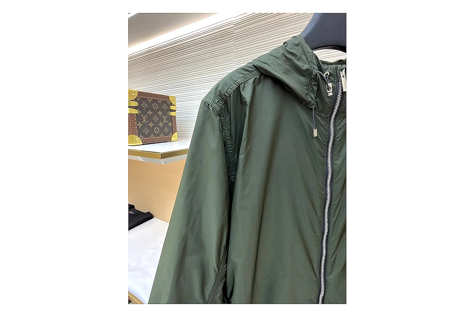 Moncler Nylon Hooded Jacket Olive Jacket shopping brief image showing olive nylon hooded jacket with nylon texture, hood structure, zipper line, sleeve cuffs, and light shell shape thumbnail 6