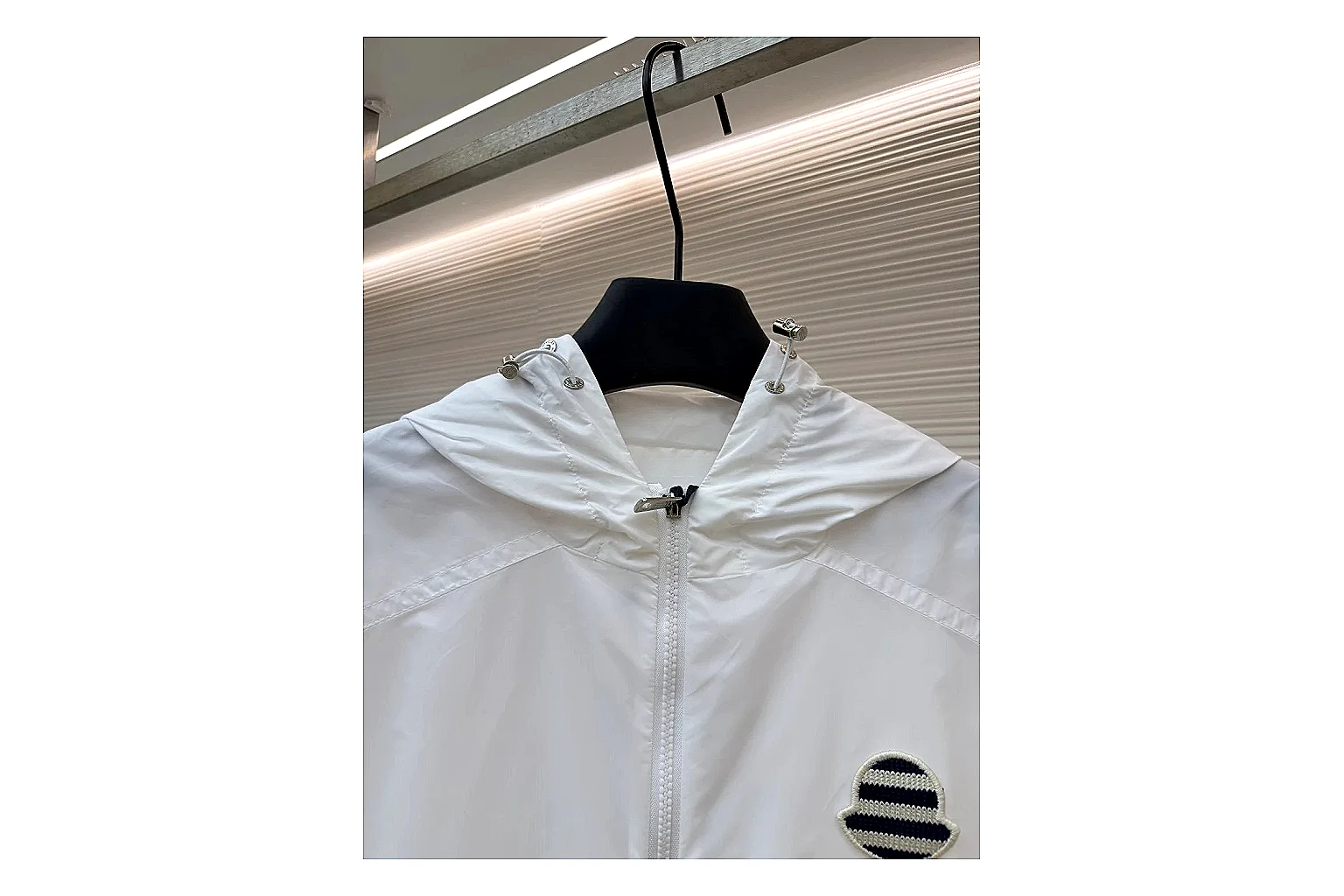 Moncler Nylon Hooded Jacket White Jacket shopping brief image showing white nylon hooded jacket with nylon texture, hood structure, zipper line, sleeve cuffs, and light shell shape thumbnail 4