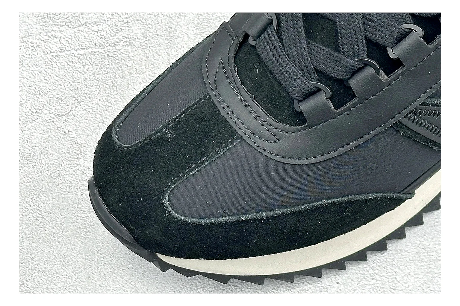 Moncler Pacey Black White shopping brief image showing black upper, white rugged outsole, low padded collar, and outdoor-leaning tread profile thumbnail 3