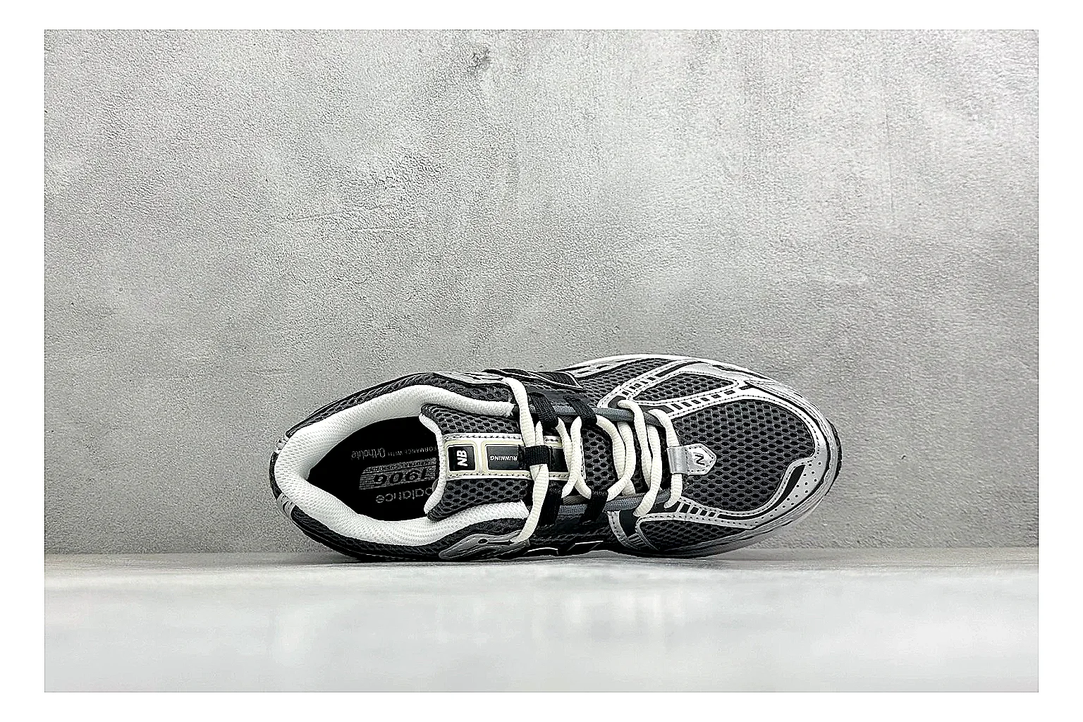 New Balance 1906 Black Silver shopping brief photo showing black mesh base, silver overlays, technical 1906 runner structure, and layered performance sole thumbnail 5