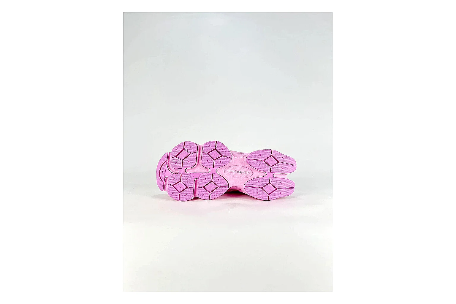 New Balance 9060 Pink Sneakers shopping brief image showing pink chunky runner sneakers with mesh-leather texture, side-profile shape, upper panel lines, and outsole detail thumbnail 2