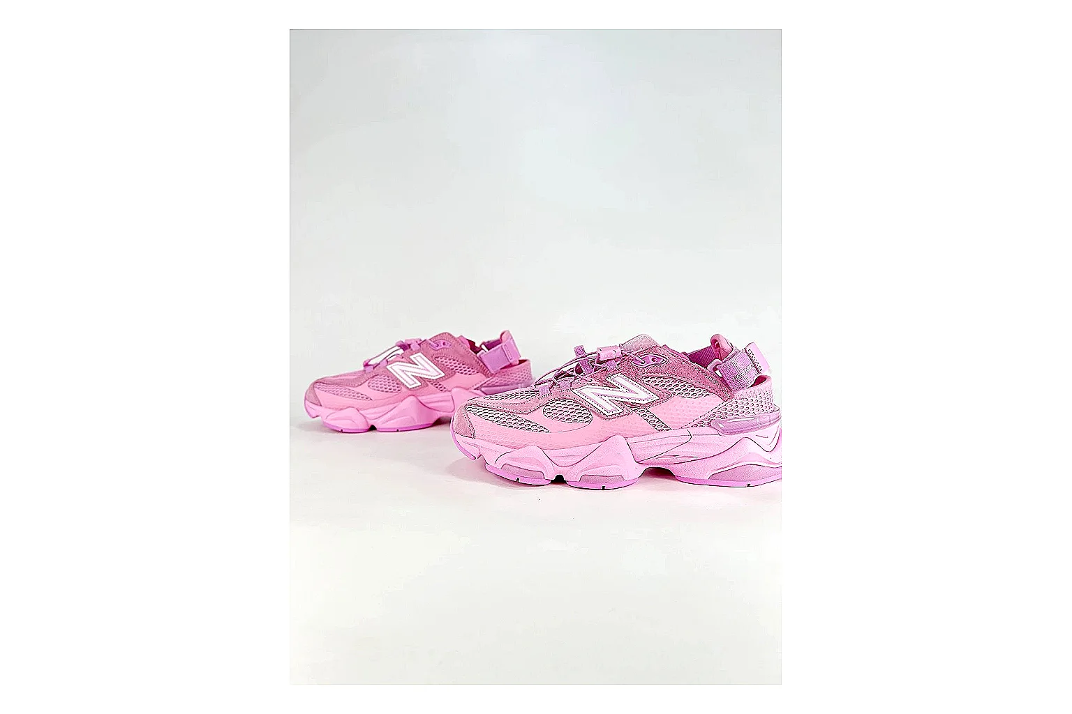 New Balance 9060 Pink Sneakers shopping brief image showing pink chunky runner sneakers with mesh-leather texture, side-profile shape, upper panel lines, and outsole detail thumbnail 3