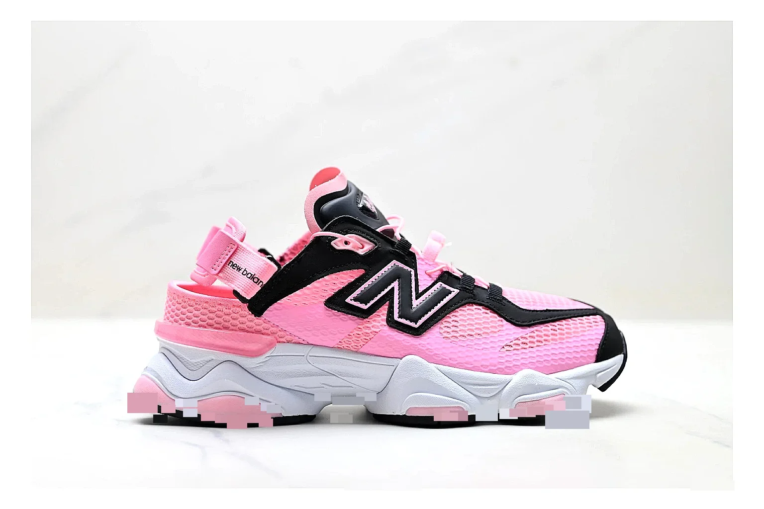 New Balance 9060 Pink Black Sneakers shopping brief image showing pink black chunky runner sneakers with mesh-leather texture, side-profile shape, upper panel lines, and outsole detail