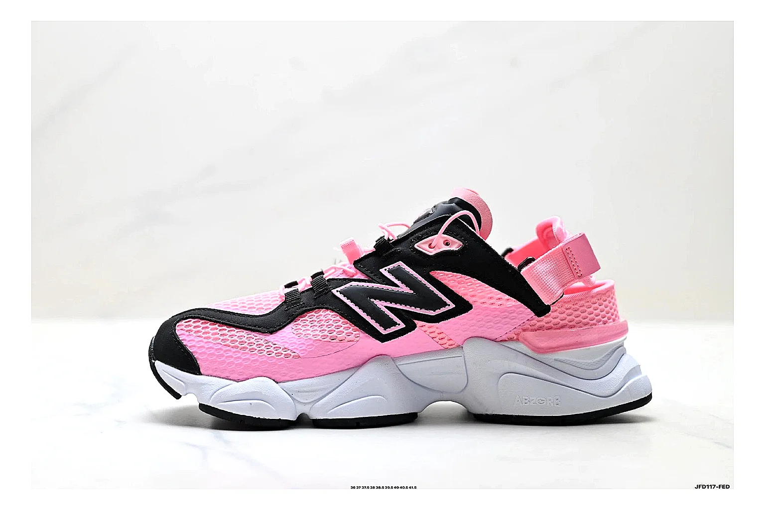 New Balance 9060 Pink Black Sneakers shopping brief image showing pink black chunky runner sneakers with mesh-leather texture, side-profile shape, upper panel lines, and outsole detail thumbnail 4