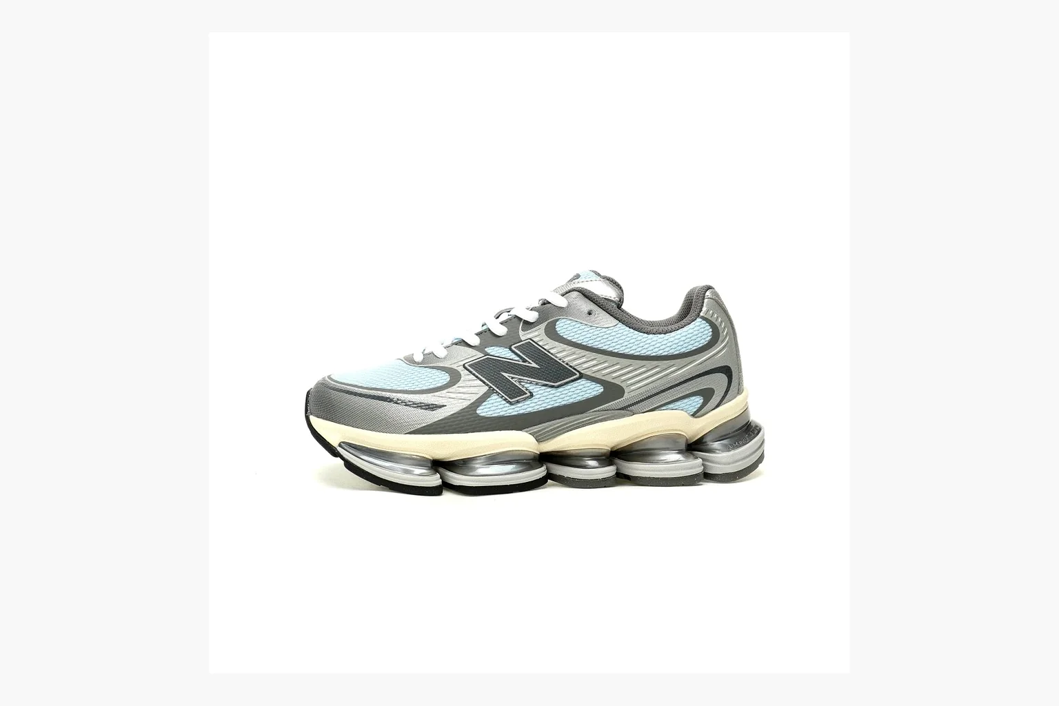 New Balance 9060 Runner Sneaker Silver Teal shopping brief image showing silver and teal NB 9060 runner with chunky sole, mesh panels, and side N logo