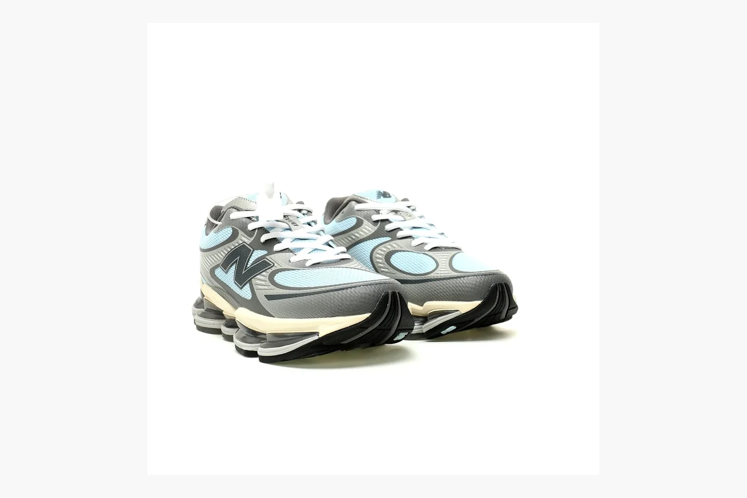 New Balance 9060 Runner Sneaker Silver Teal shopping brief image showing silver and teal NB 9060 runner with chunky sole, mesh panels, and side N logo thumbnail 2