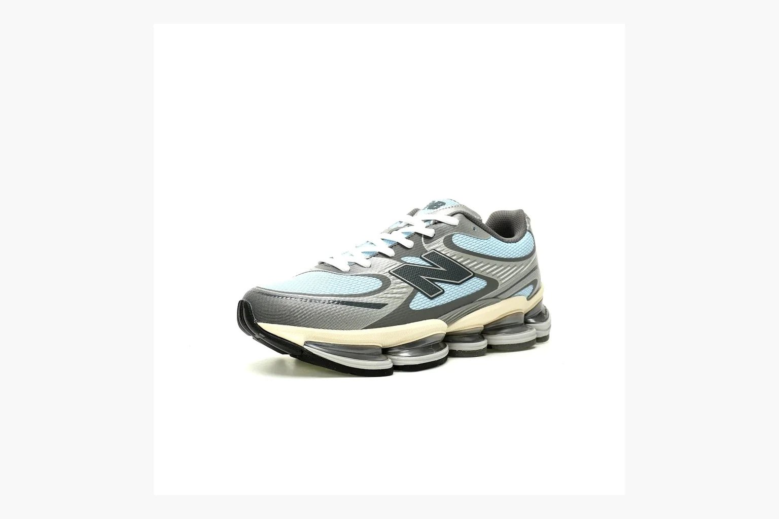 New Balance 9060 Runner Sneaker Silver Teal shopping brief image showing silver and teal NB 9060 runner with chunky sole, mesh panels, and side N logo thumbnail 4