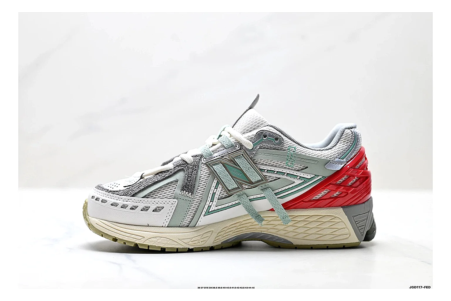 New Balance M1906 Silver Red Sneakers shopping brief image showing silver red retro runner sneakers with mesh-leather texture, side-profile shape, upper panel lines, and outsole detail thumbnail 4