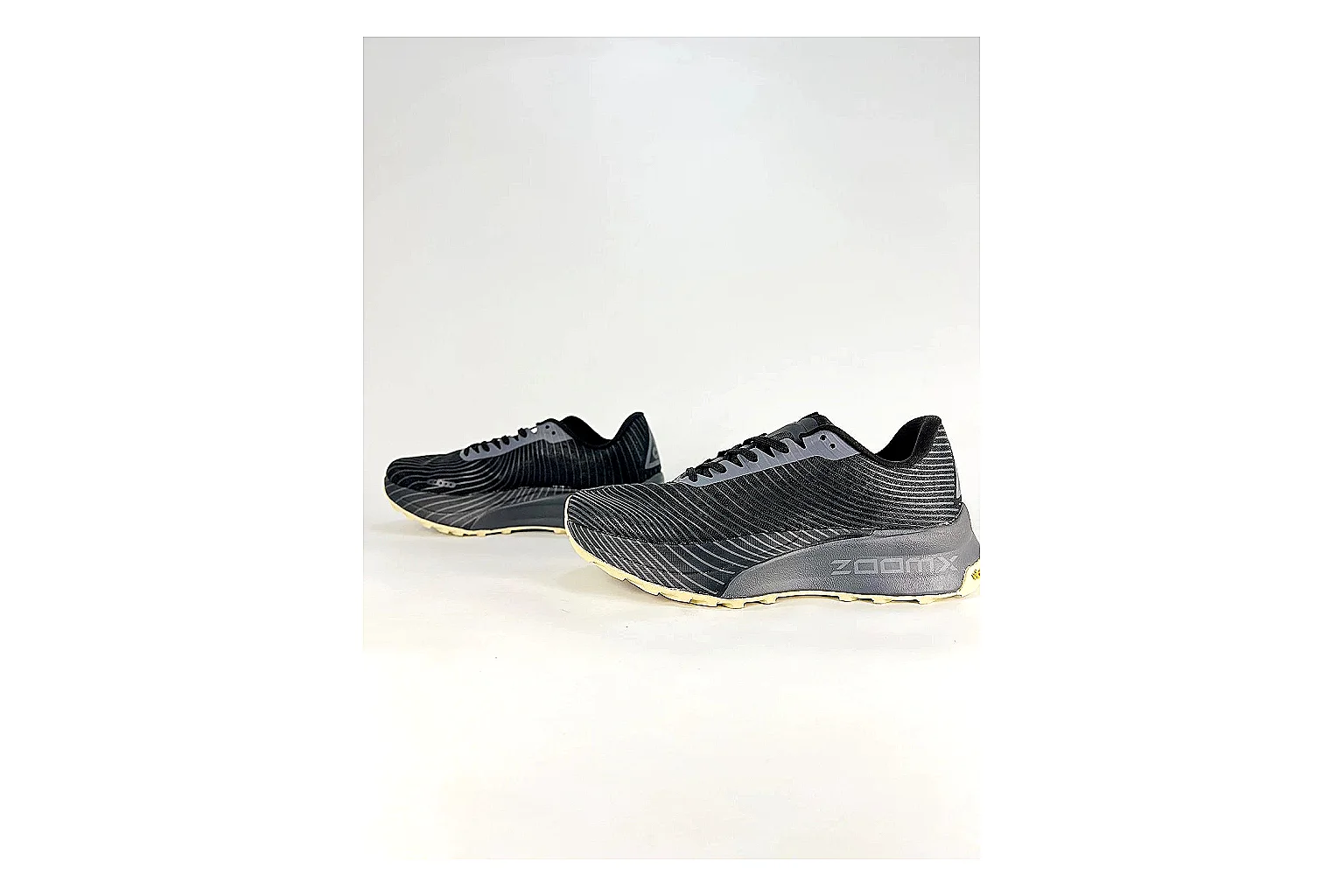 Nike ACG Ultra Black Gum Sneakers shopping brief image showing black gum outdoor sneakers with textile texture, side-profile shape, upper panel lines, and outsole detail thumbnail 3