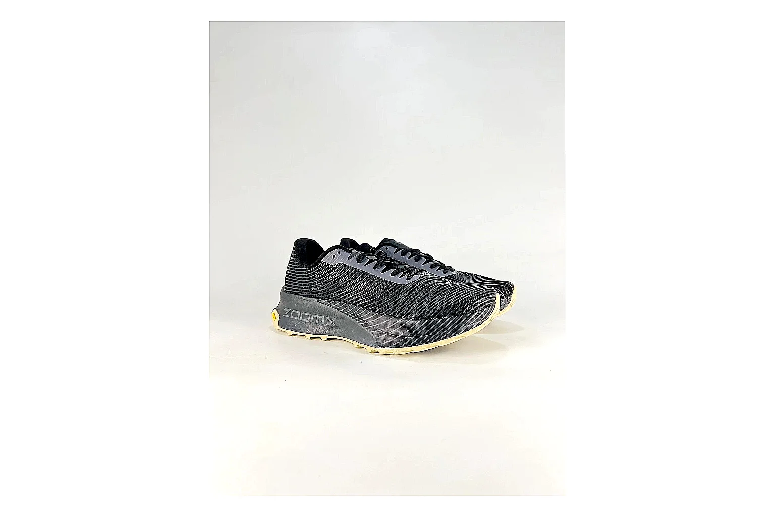 Nike ACG Ultra Black Gum Sneakers shopping brief image showing black gum outdoor sneakers with textile texture, side-profile shape, upper panel lines, and outsole detail thumbnail 4