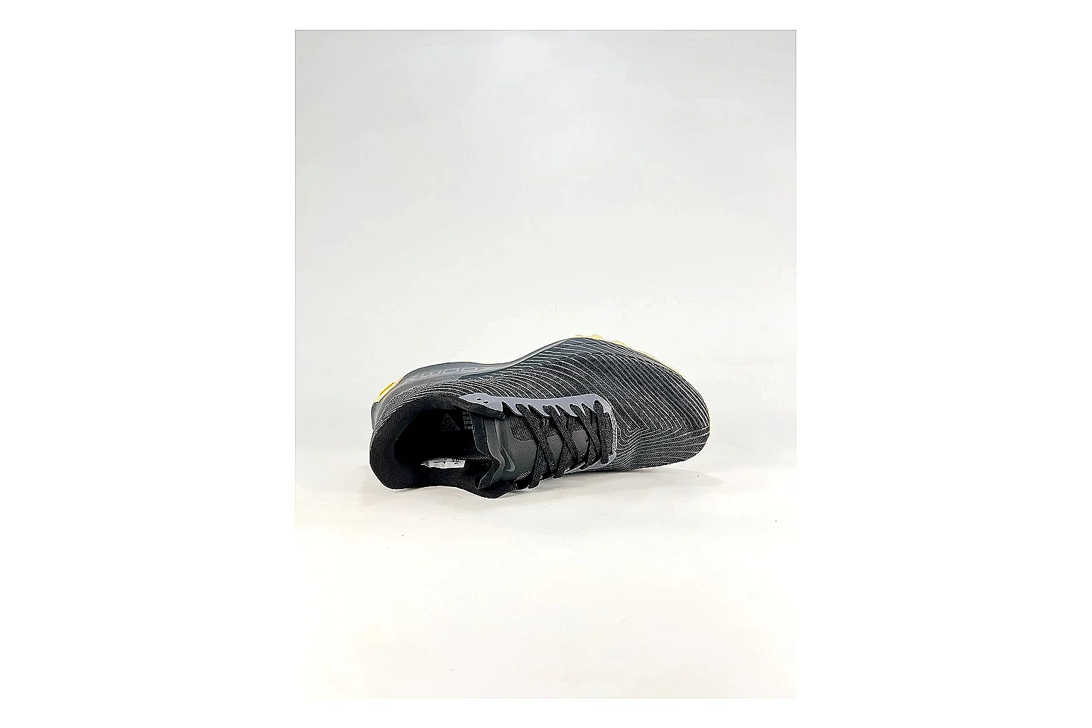 Nike ACG Ultra Black Gum Sneakers shopping brief image showing black gum outdoor sneakers with textile texture, side-profile shape, upper panel lines, and outsole detail thumbnail 5