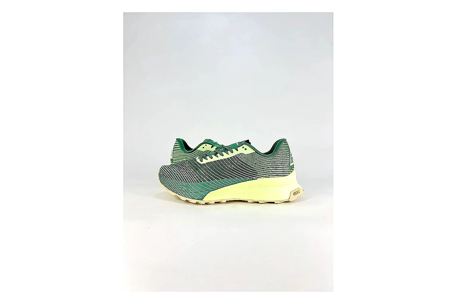 Nike ACG Ultra Green Lime Sneakers shopping brief image showing green lime outdoor sneakers with textile texture, side-profile shape, upper panel lines, and outsole detail