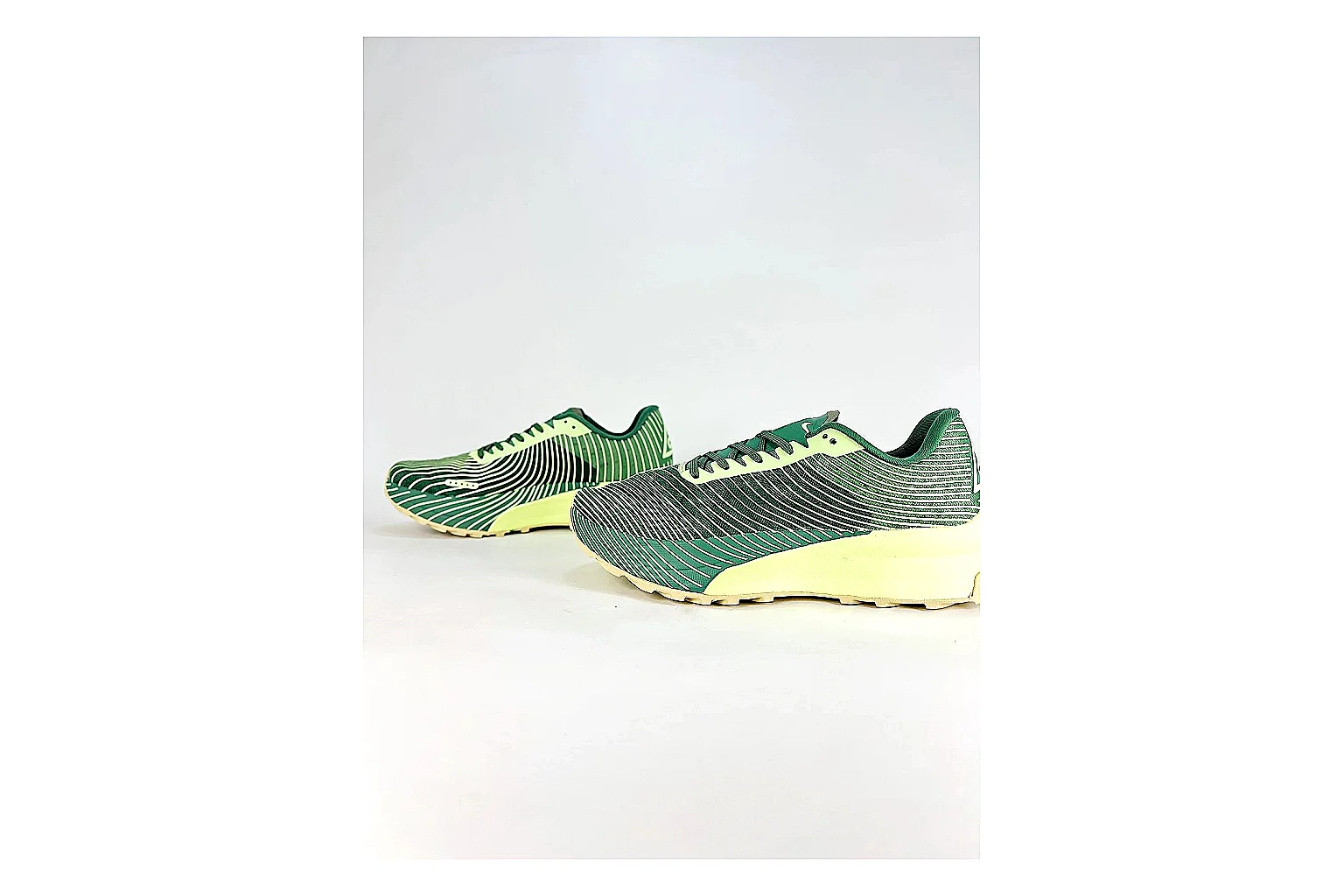 Nike ACG Ultra Green Lime Sneakers shopping brief image showing green lime outdoor sneakers with textile texture, side-profile shape, upper panel lines, and outsole detail thumbnail 3