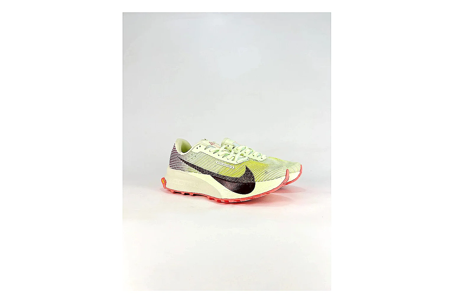 Nike ACG Ultra Lime Pink Sneakers shopping brief image showing lime pink outdoor sneakers with textile texture, side-profile shape, upper panel lines, and outsole detail thumbnail 4